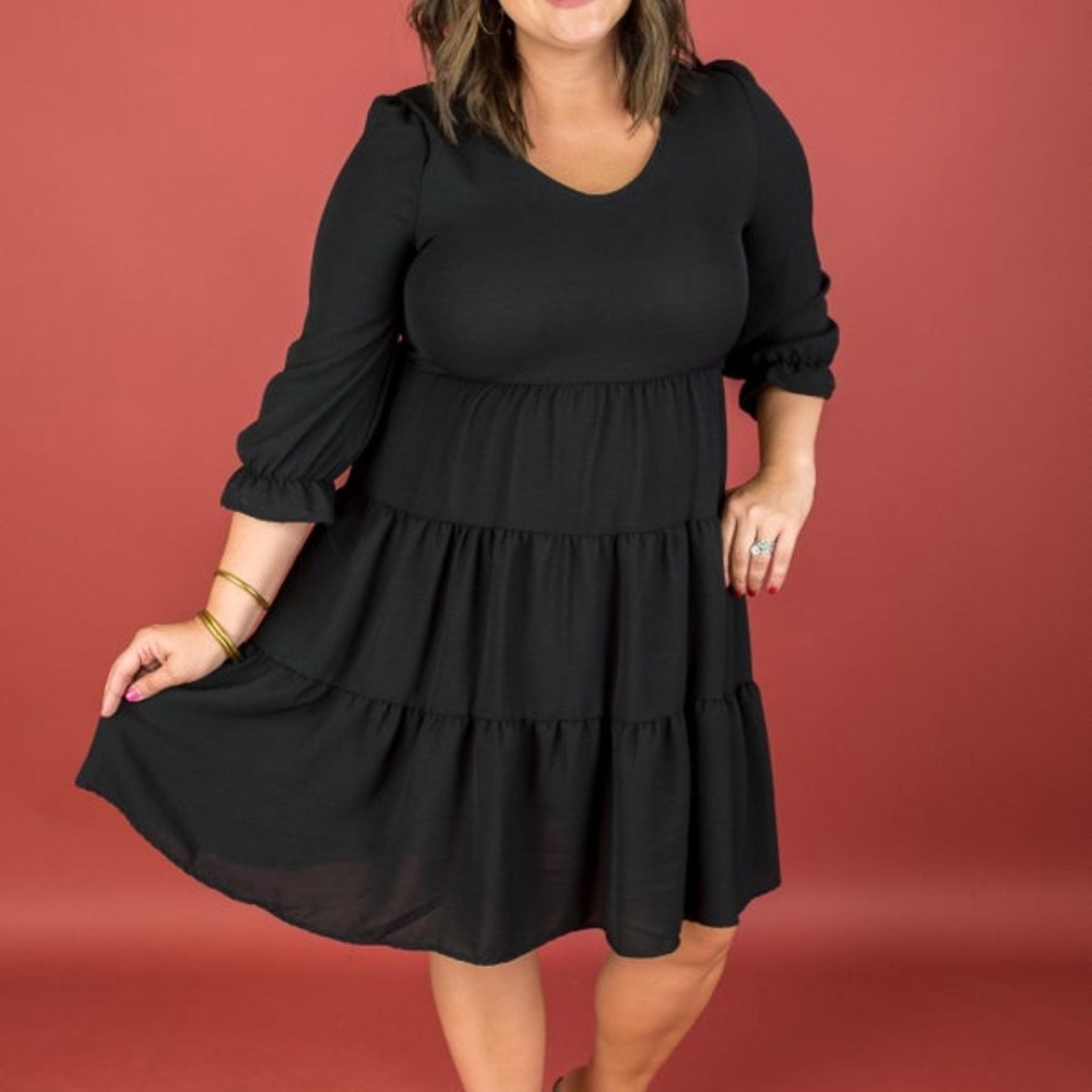 Black tiered quarter sleeve dress